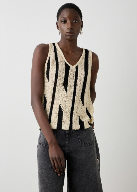 Top beige raya negra