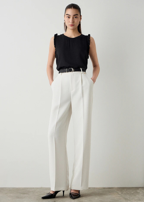 Blusa negra satinada volantes