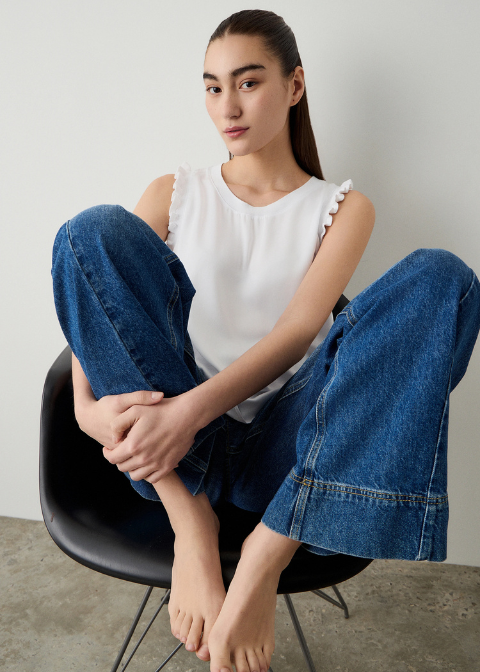 Blusa blanca satinada volantes