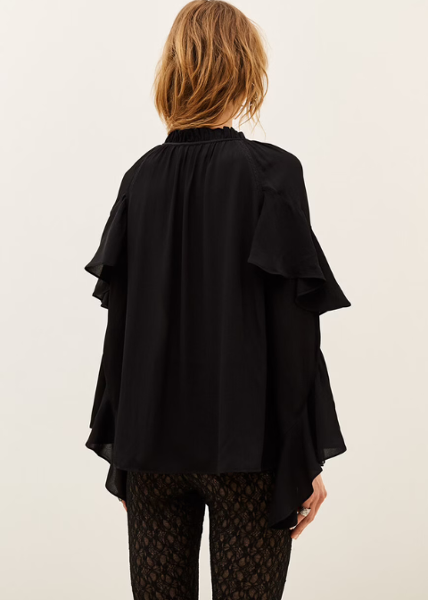 Blusa BA&SH con volantes, lazos y detalles de encaje